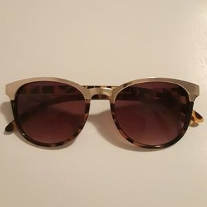 Tortoise with gold sunglasses